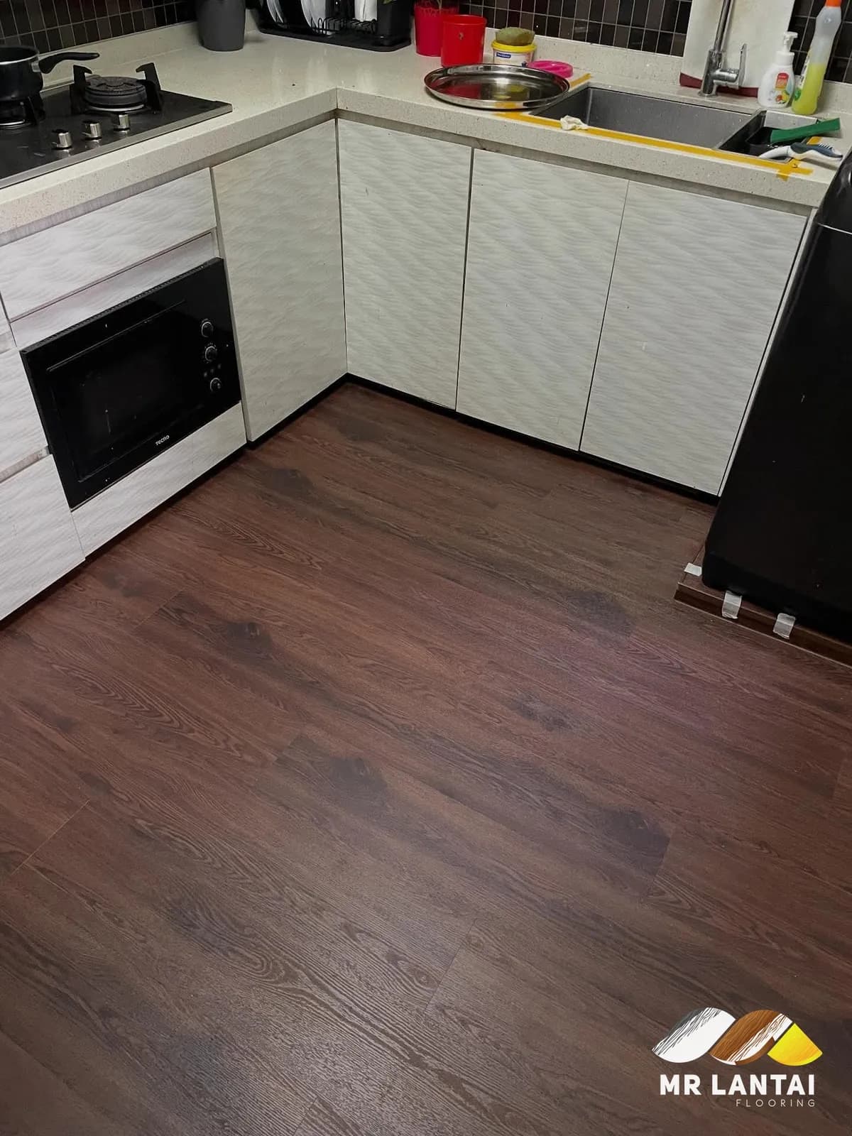Dark walnut SPC, kitchen — SPC flooring installed by Mr Lantai