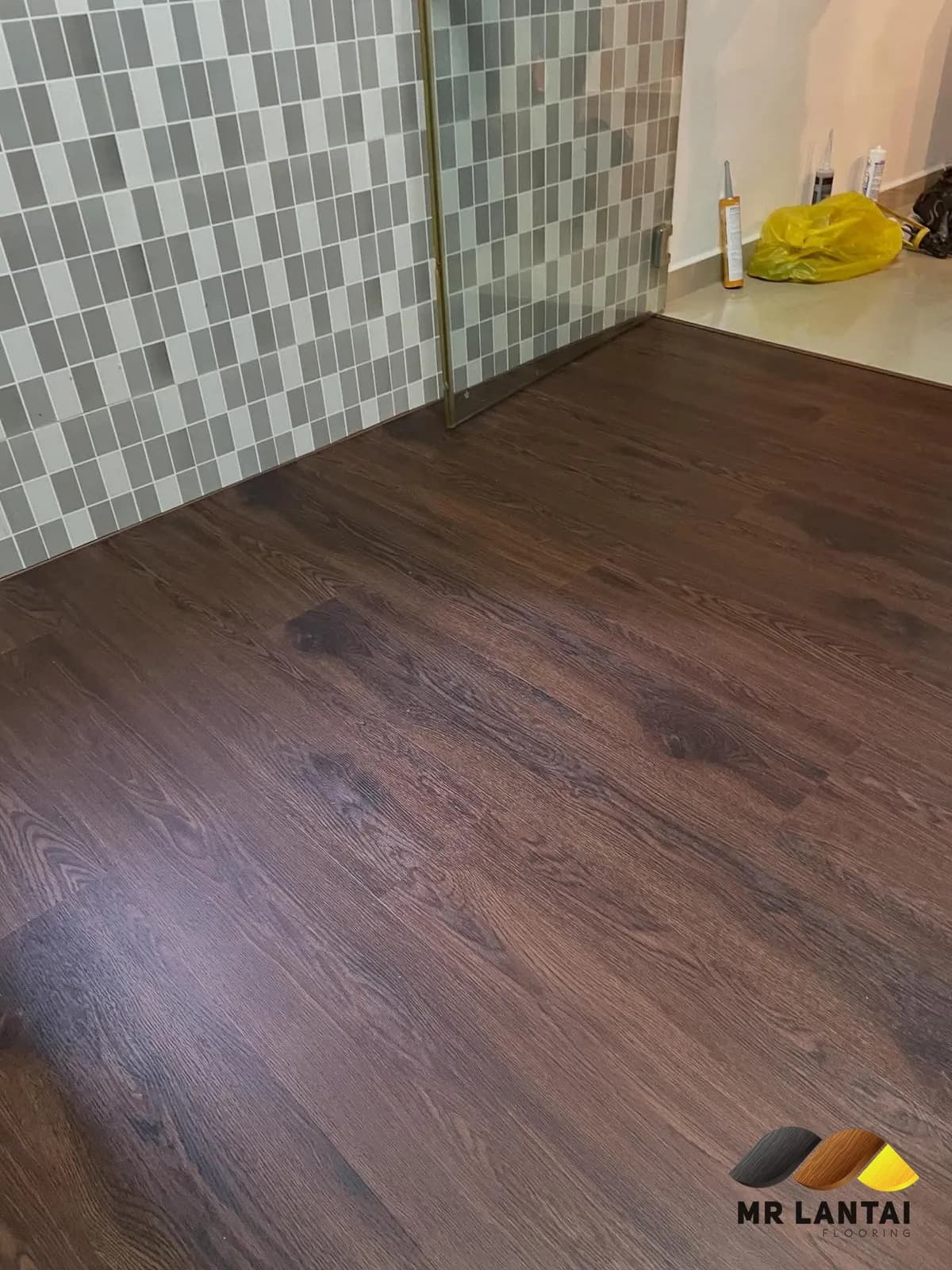 Dark walnut SPC, dining area — SPC flooring installed by Mr Lantai